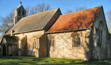 Burrough Church, An old stone church with a bellcote and tiled roof.