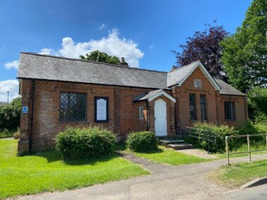 Exterior Reading Room A single-storey red brick Borough Green Reading Room building with a grey slate roof.